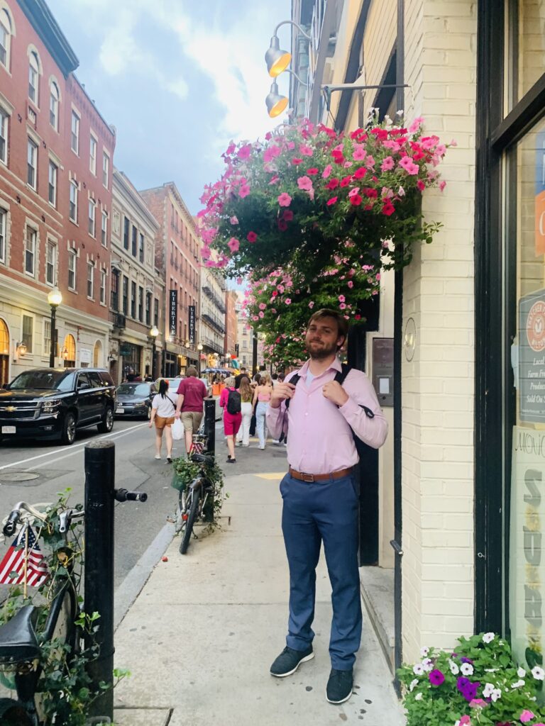 Guy under flowers in the North End Boston