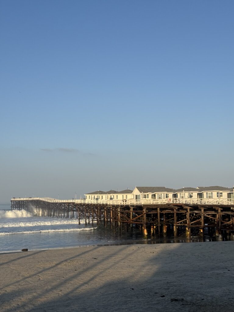 Pacific Beach at Sunrise with Pier and cottages
