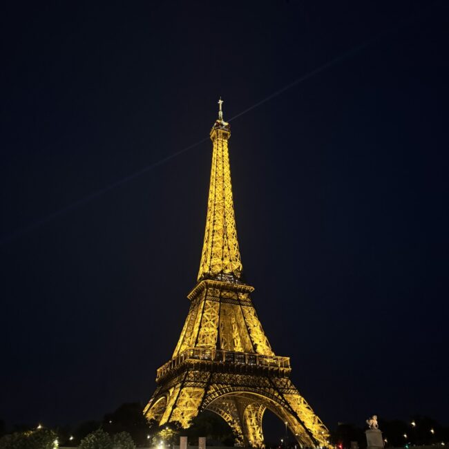 Eiffel Tower at night from Siene river view