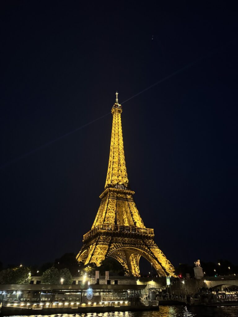 Eiffel Tower at night from Siene river view