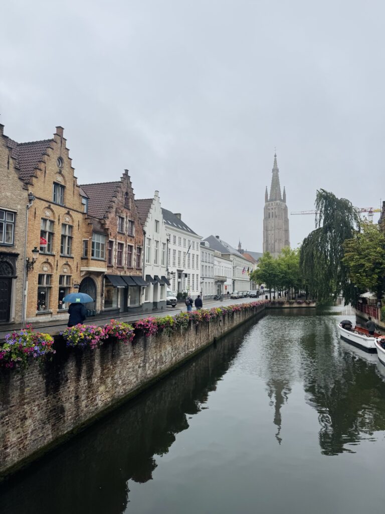 Church of Our Lady Bruges and river in Bruges Belgium