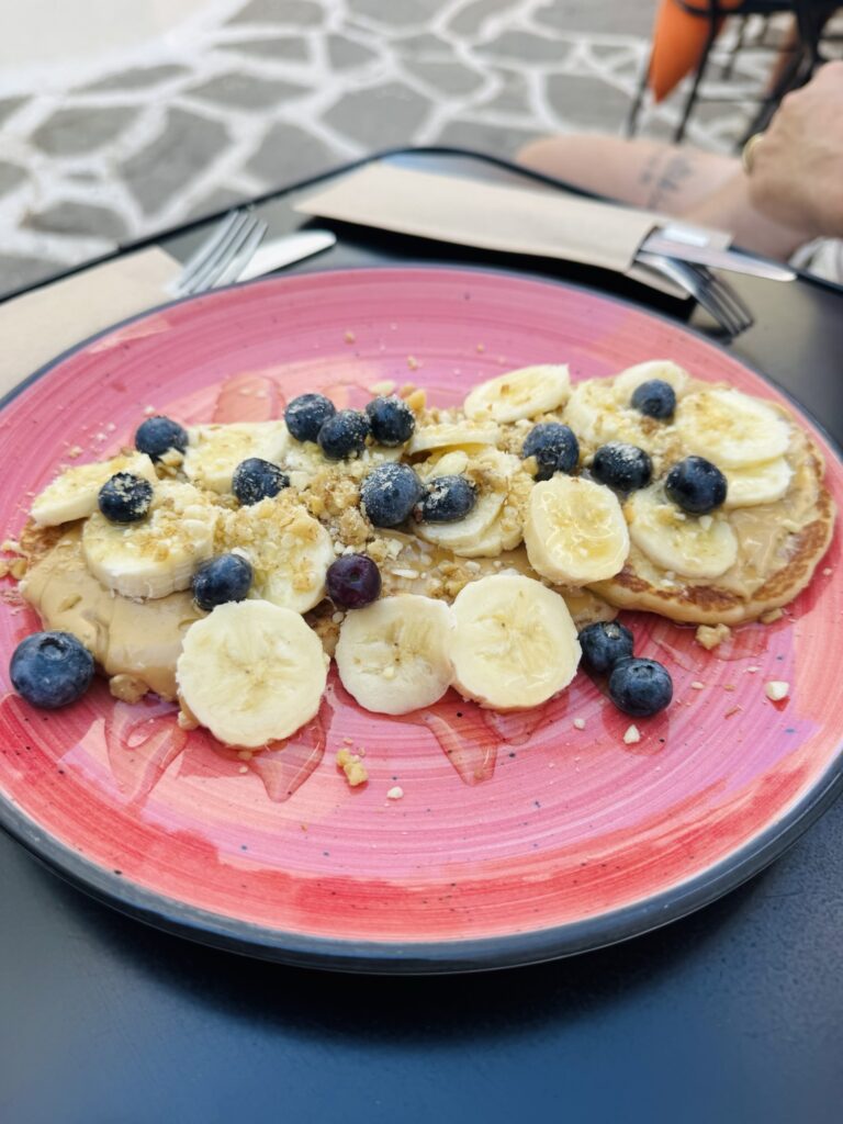 Peanut butter, honey, bananas, and blueberry pancakes