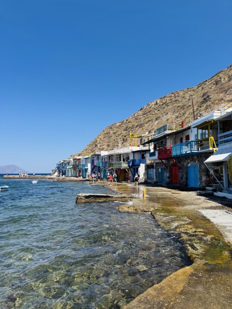 Klima, Milos view of colorful "syrmata" boathouses right on the water’s edge