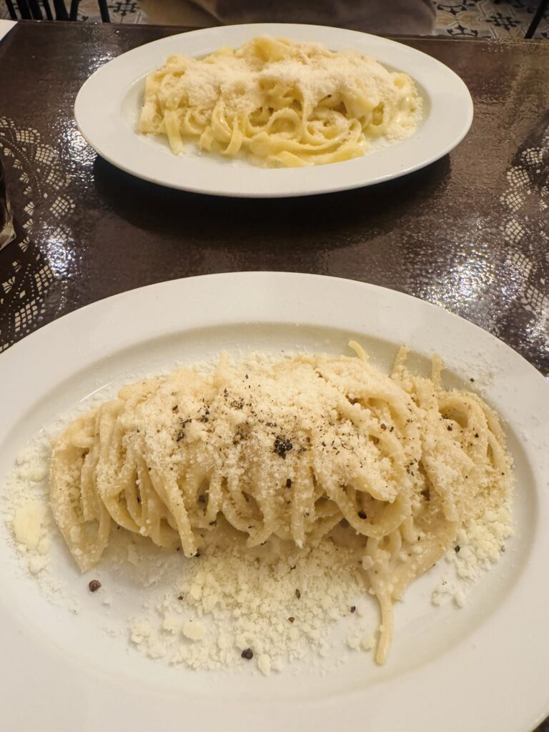 Fettuccini alfredo and cacio pepe at restaurant in Valletta