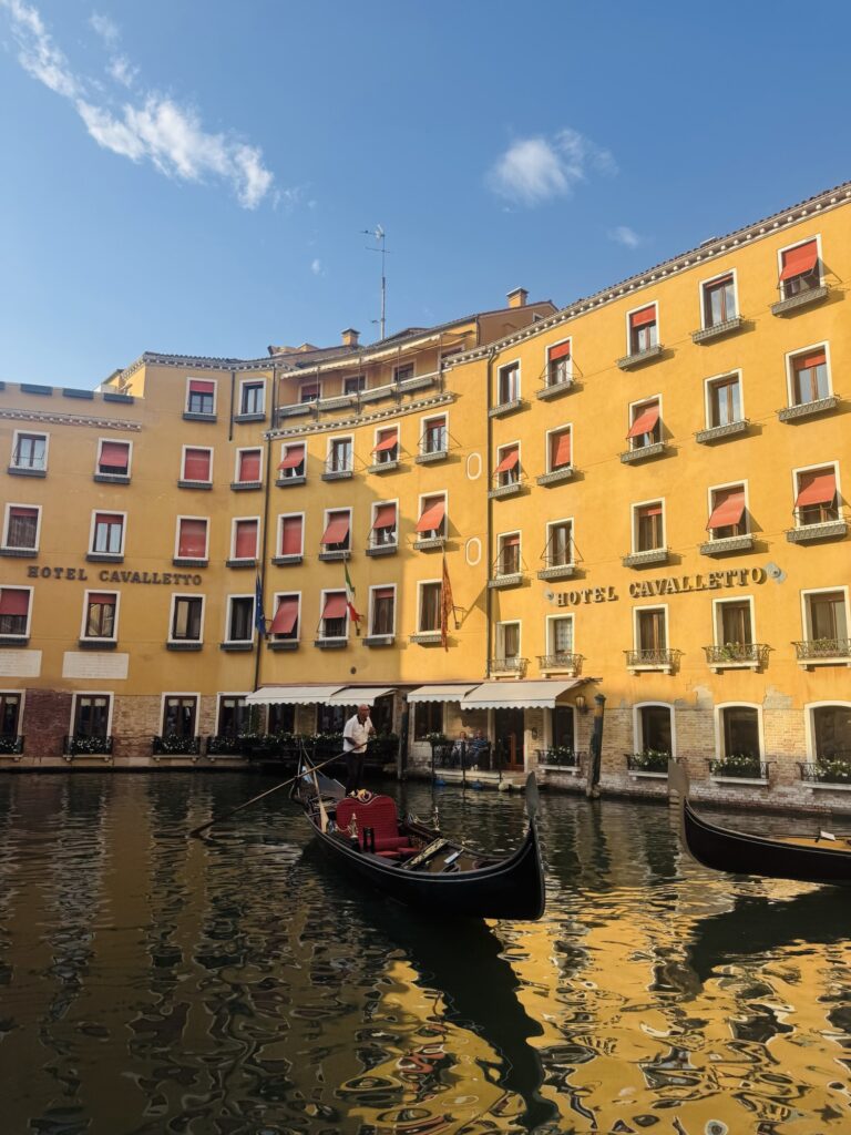 Gondola in front of Hotel Cavalletto in Venice Italy