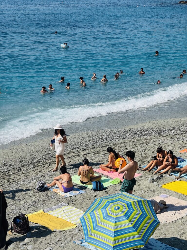 Monterosso beach with swimmers