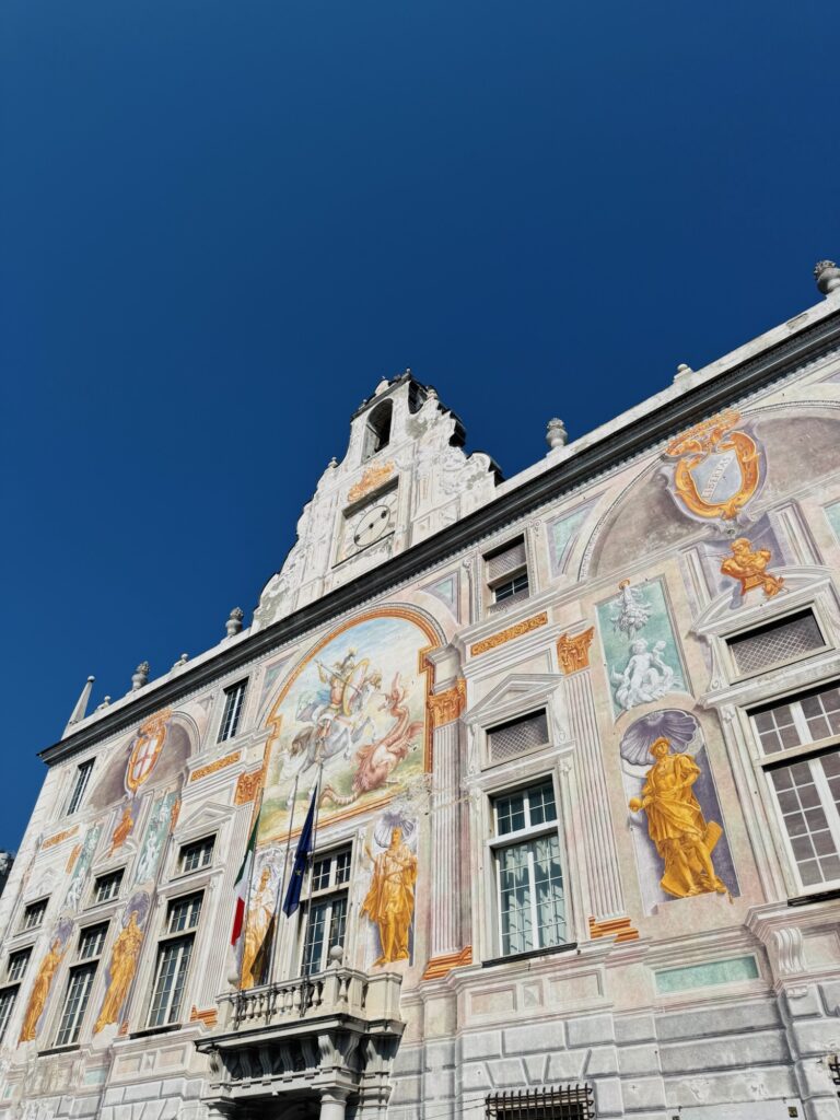 Painted building and blue sky in Genoa Italy